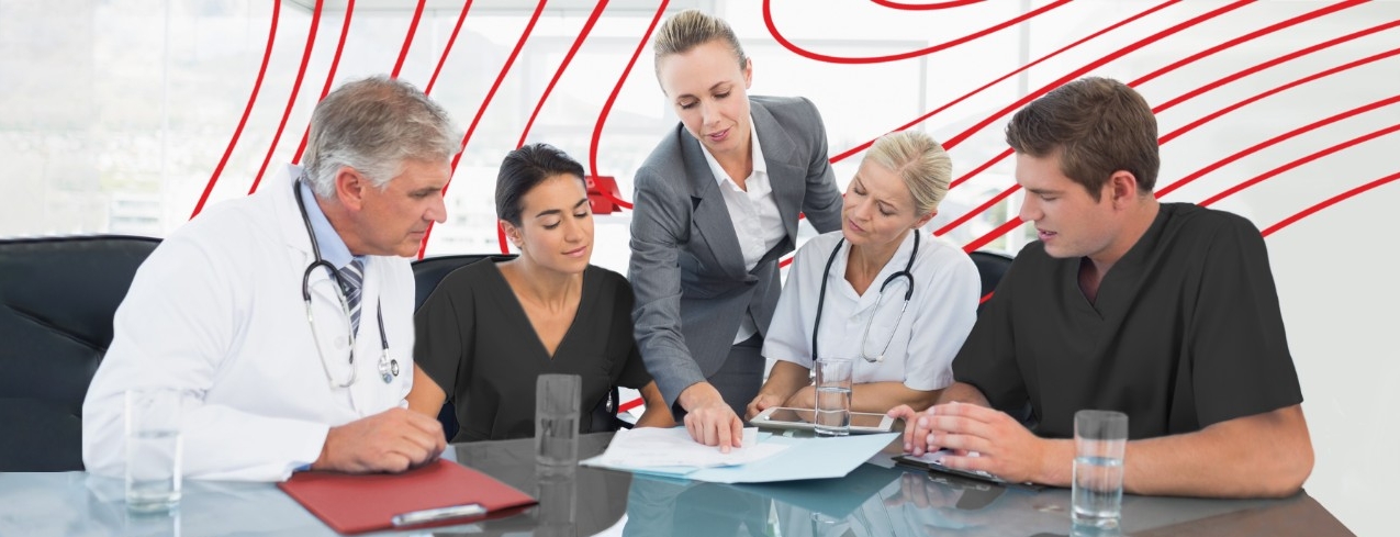 heathcare administrators and workers in meeting